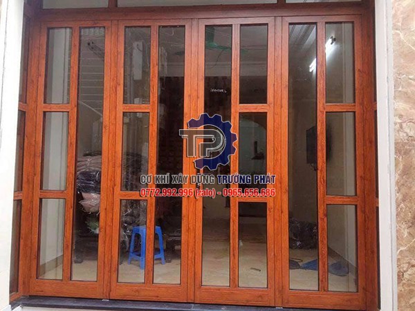 Dịch vụ thi công lắp đặt cửa nhôm nguyên tấm vân gỗ chuyên nghiệp tại TP Hồ Chí Minh